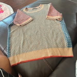 Anthropogenic short shelf sweater